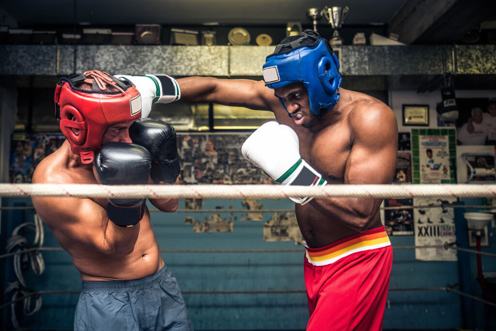 men boxing in head gear